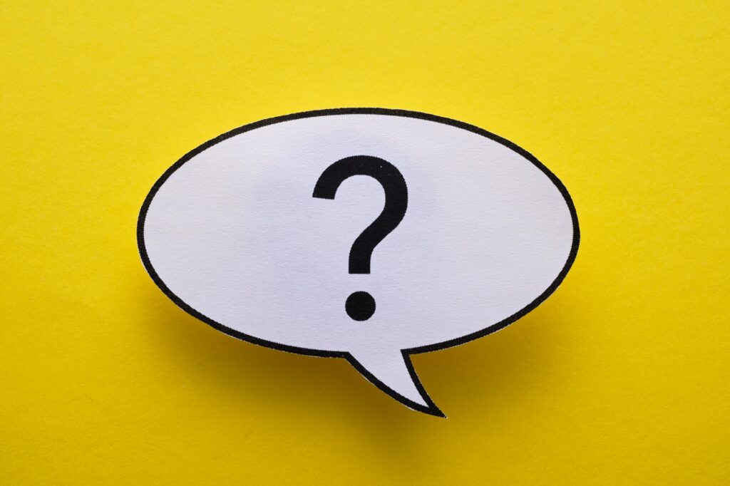 Oval speech or thought bubble with question mark