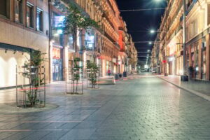 Shopping street at night in the center of Toulouse city, France